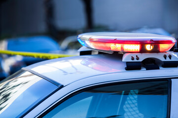 Detail view of illuminated police lights. © Matt Gush