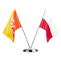 Two table flags isolated on white background 3d illustration, bhutan and poland