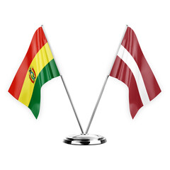 Two table flags isolated on white background 3d illustration, bolivia and latvia