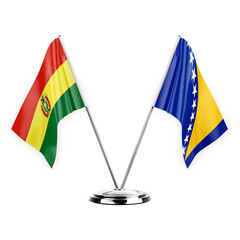 Two table flags isolated on white background 3d illustration, bolivia and bosnia