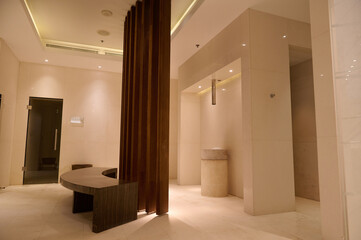 Luxurious interior of a hall in the bath and sauna at wellness spa center with marble walls