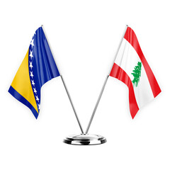 Two table flags isolated on white background 3d illustration, bosnia and lebanon