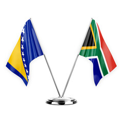 Two table flags isolated on white background 3d illustration, bosnia and south africa