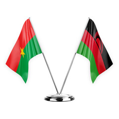 Two table flags isolated on white background 3d illustration, burkina faso and malawi