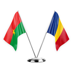 Two table flags isolated on white background 3d illustration, burkina faso and romania