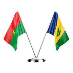 Two table flags isolated on white background 3d illustration, burkina faso and saint vincent and the grenadines