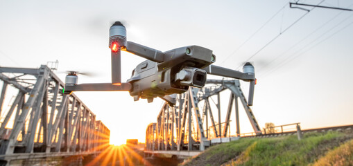 Railway bridge sun dawn summer grass drone