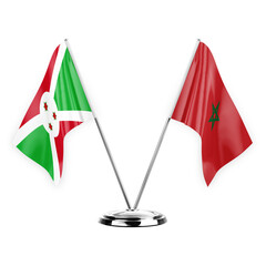 Two table flags isolated on white background 3d illustration, burundi and morocco