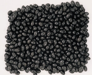 Smoked market fresh black olives as background