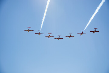 Beautiful formation flight, by 7 planes during an air show - obrazy, fototapety, plakaty