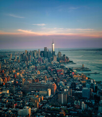 New York city skyline at sunset aerial buildings sea sky clouds urban Manhattan  