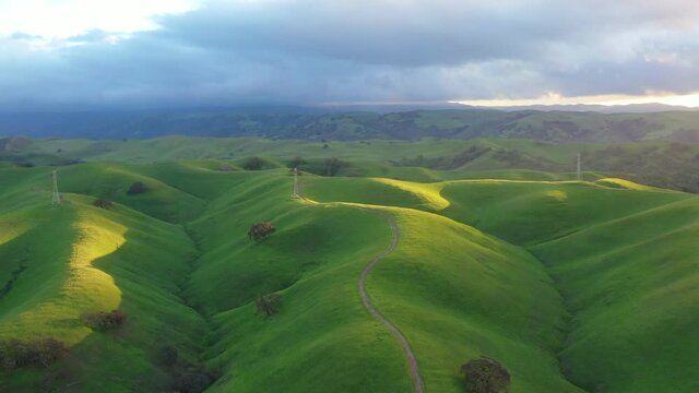 The last light of day illuminates the rolling hills and valleys of the Tri-valley area of Northern California, just east of San Francisco Bay. This region is known for its vineyards and open space.