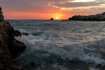 beautiful sunset on the sea in a storm