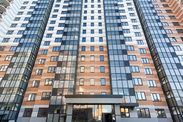 modern multi-apartment multi-storey residential building with apartments, bottom view