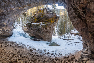 Johnston canyon cave frozen in winter, Canada