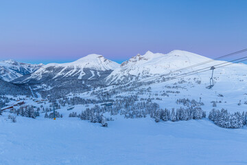 Fototapeta na wymiar Ski resort and mountains Sunshine Village sunset, Canada