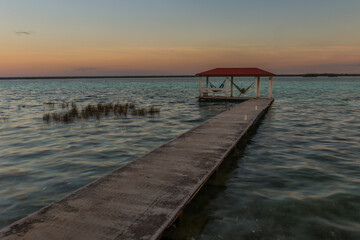 Caribbean sunset scene at Bacalar lagoon, Mexico