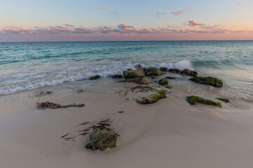 Caribbean beach in Mexico at sunset