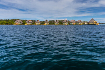 Fototapeta premium Vacation bungalows over water on the Caribbean sea, Bocas del toro