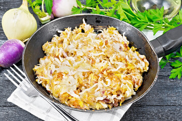 Turnip fried in pan on board