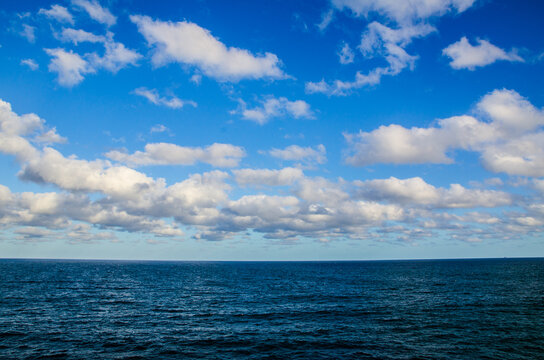 Beautiful cloudy sky with dark blue ocean view at Bondi bay, Sydney, Australia.
