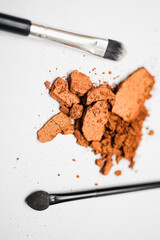 make up brush and powder