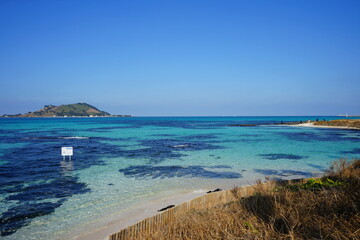 Fototapeta na wymiar a wonderful seascape with clear water and island