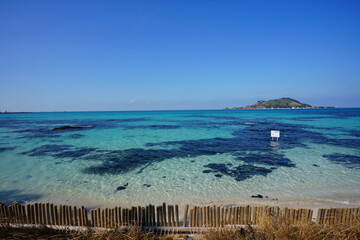 a wonderful seascape with clear water and island