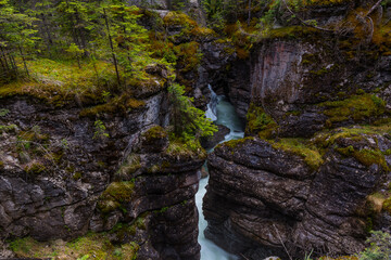 The Maligne River as it flows through the deep gorges of the Maligne Canyon in Jasper National Park in Alberta Canada
