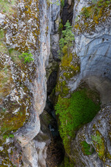 The Maligne River as it flows through the deep gorges of the Maligne Canyon in Jasper National Park in Alberta Canada