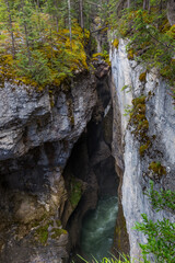 The Maligne River as it flows through the deep gorges of the Maligne Canyon in Jasper National Park in Alberta Canada