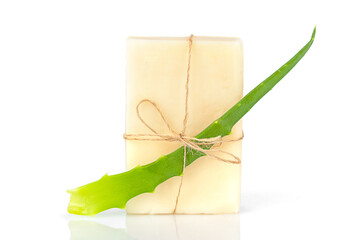 Soap and fresh Aloe vera leaf on a white background isolated, front view, close-up. Natural cosmetic.