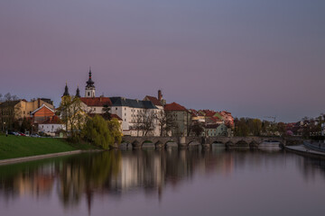 Fototapeta premium Oldest bridge in Czech republic. Beautiful evening twilight with beautiful bridge in Pisek.