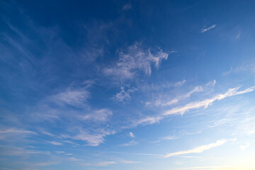 Light blue clouds on the blue sky.