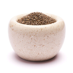 Stone mortar full of organic natural chia seeds close-up isolated on white background