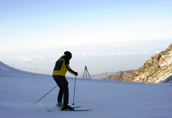 Active lifestyle and sports: rest in a ski resort. Skiing, snowboarding. Nice alpine view. Downhill