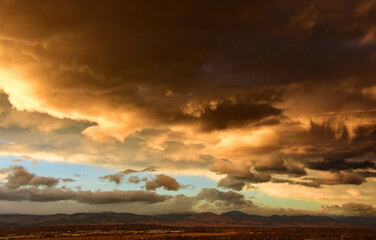 ominous late  afternoon  storm  clouds over the front range of the colorado rocky mountains, as seen from broomfield,colorado