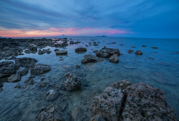 Long exposure during low tide with exposed coral on Turtle Island, Borneo
