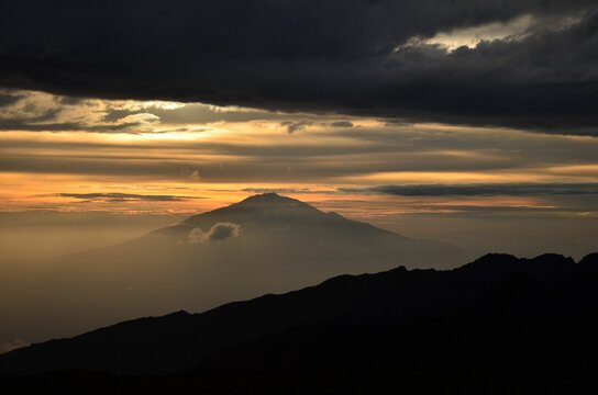 beautiful sunset on the kilimanjaro with a view of mount meru in tanzania shira camp.Hike to the highest mountain afirka