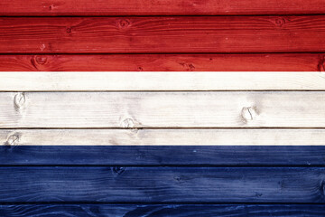 Flag of Netherlands on wooden surface 
