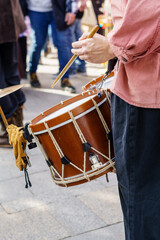 Musician playing the drum during a traditional medieval folklore festival