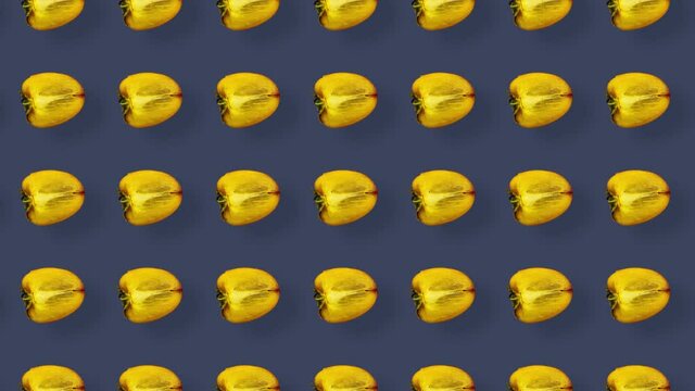 Colorful pattern of fresh orange persimmons. Top view. Seamless pattern with persimmon sliced. Pop art design. Realistic animation. 4K video motion