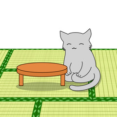 テーブルの横で座る笑顔の猫