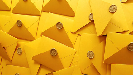 Yellow envelopes with wax seal a lot. Concept of letters, messages, correspondence, wedding...