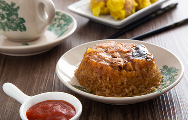 Dim Sum Loh Mai Kai. Steamed Glutinous Rice with chicken mushrooms and sausage