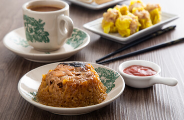 Dim Sum Loh Mai Kai. Steamed Glutinous Rice with chicken mushrooms and sausage