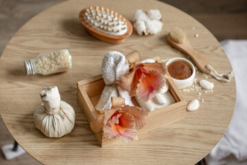 Spa composition with Thai orchid flowers and bath accessories.