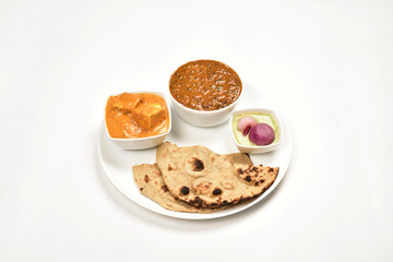 Dal Makhani and Shahi Paneer Served with Roti in Plate Isolated on White Background, Indian Main Course