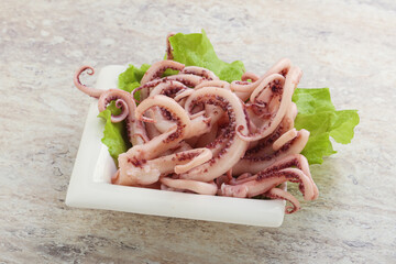 Marinated squid tentacles in the bowl