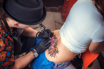 Skin master designs a tattoo tattoo parlour